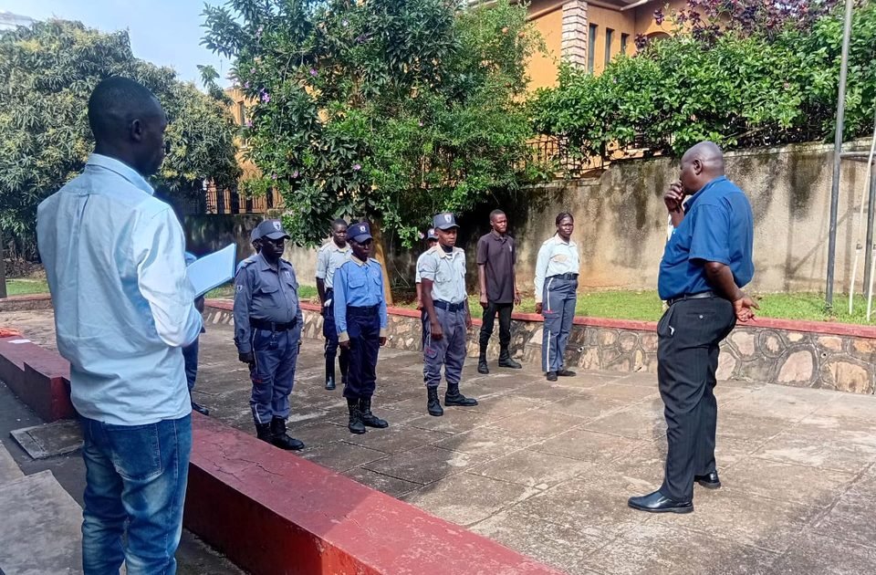 Two officers briefing a line of Neptune guards in a courtyard