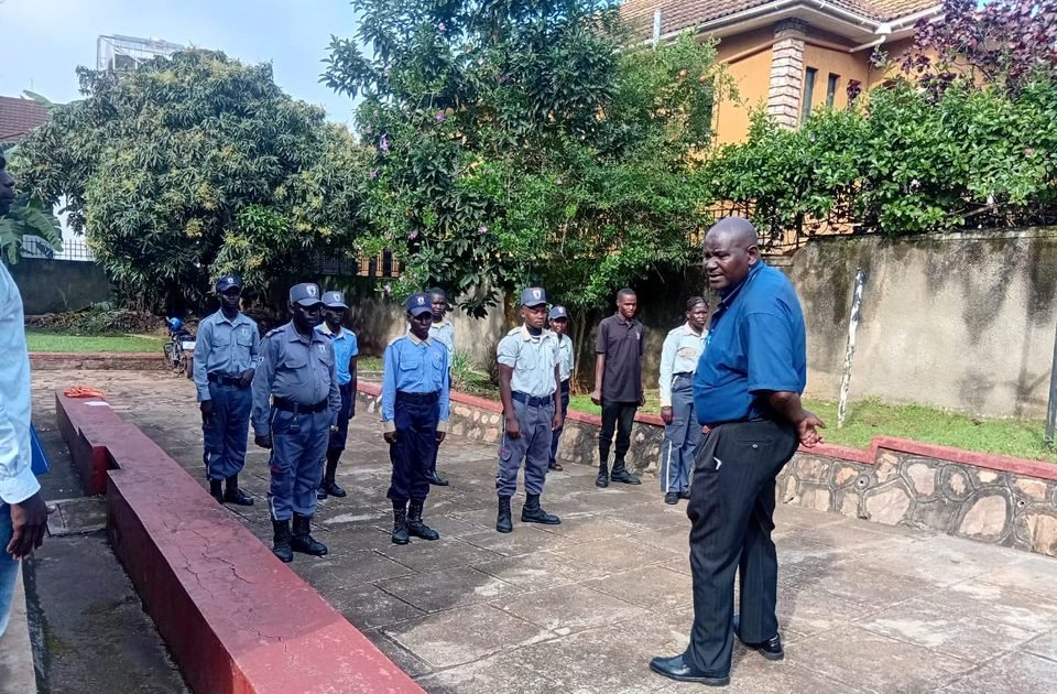 A supervisor addressing guards on parade